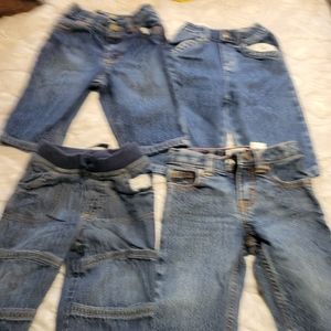 4 pair of jeans size 6-9 month
